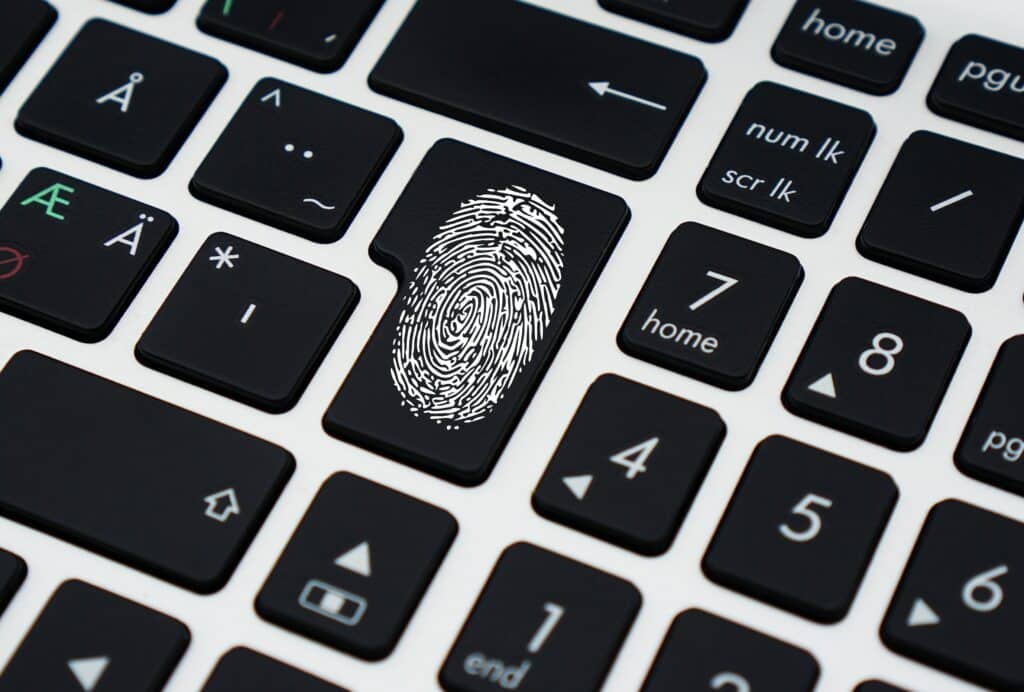 white fingerprint on black keyboard