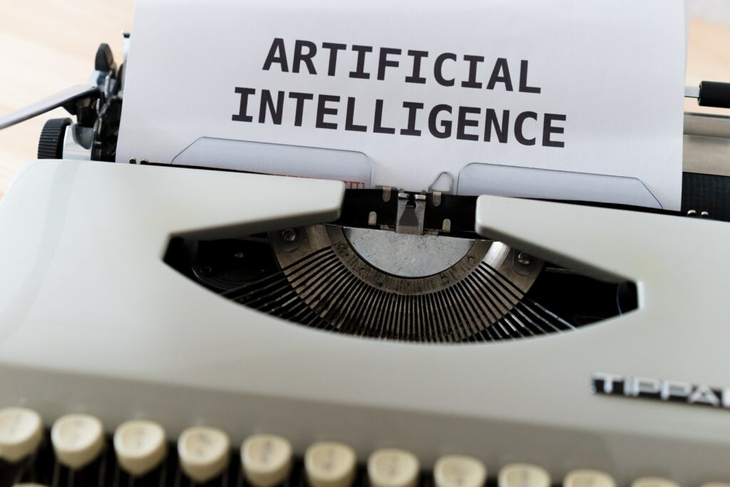 artificial intelligence written on paper in typewriter