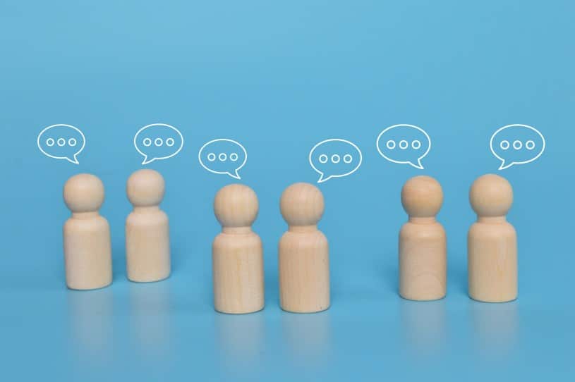 online members area security - wooden figures with speech bubbles