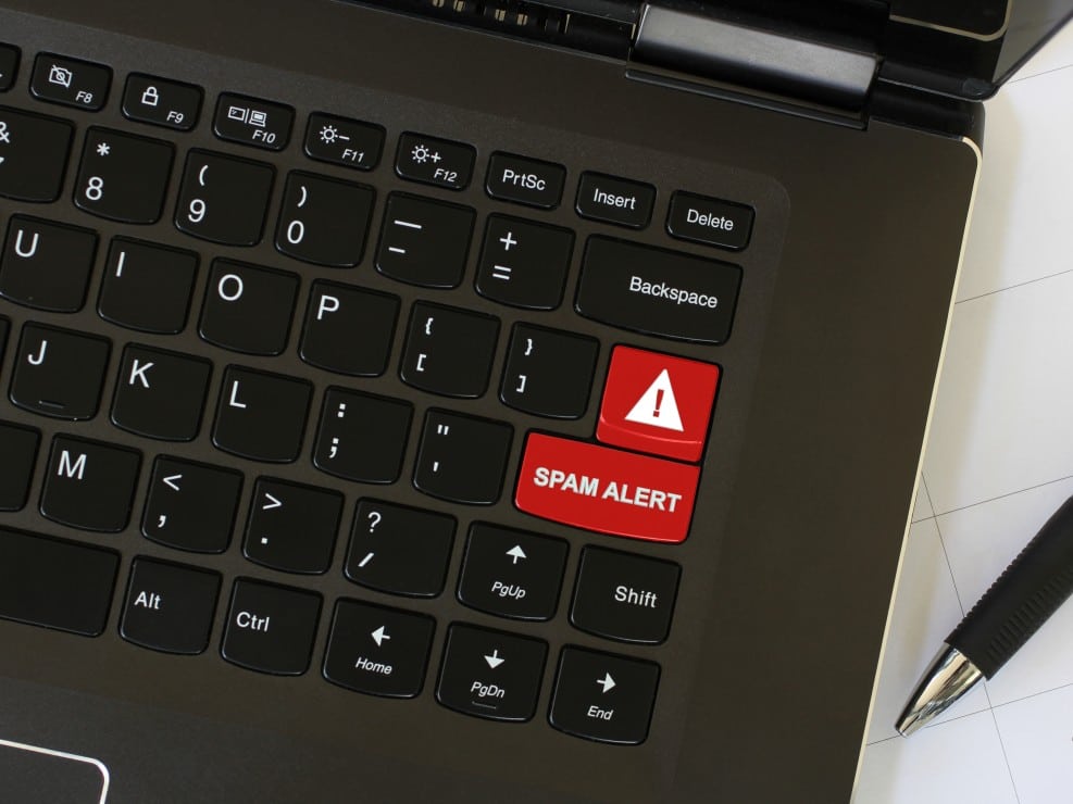 keyboard with red spam alert button - spam email alerts
